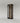 The Wine Square CAVEA single door glass wine cellar with Meadow oak wood grain interior finish — floor-to-ceiling matte black aluminum frame with label-forward horizontal racking
